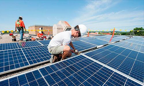 a man working on a solar panel roof.